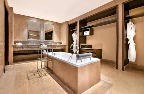 Village Road Resort | Your Perfect Holiday Room with Terrace, Aqua Fun, and Beachside Relaxation
