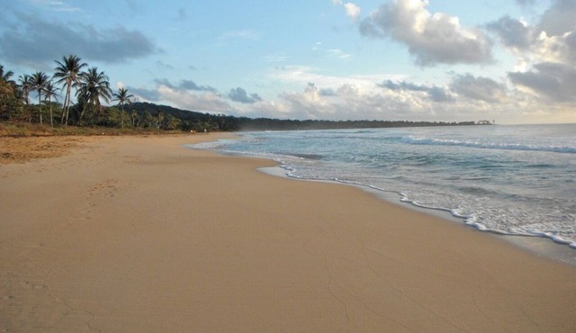 2 story home on beach, large breezy veranda for seamless indoor, outdoor living.