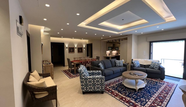 3 bed room apartment with modern kitchen indoor and out door seating area .