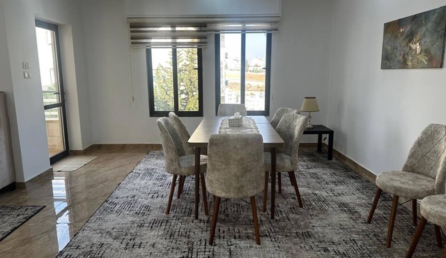 (5) 3-bedroom quiet apartment with free parking, balcony & sitting areas.