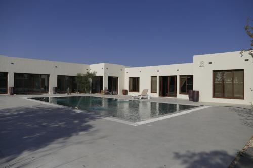 Al Ain Farm Escape with Private Pool , Mini Golf , and Firepit