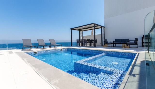 Arabian Gulf-Facing 4BR Villa with Two Assistant Room, Heated Pool and Barbecue Space, Al Dana Island, Fujairah