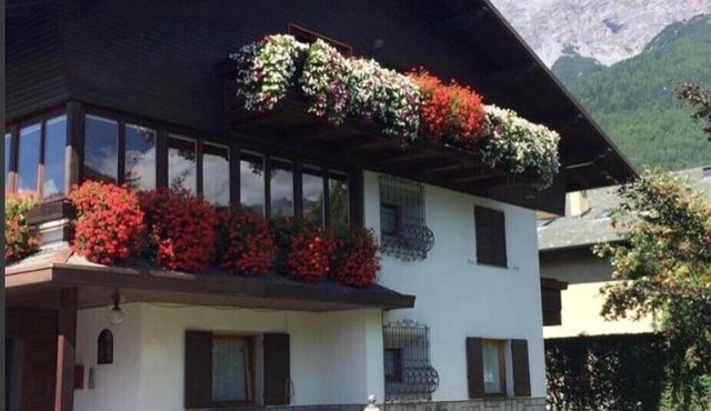 BEAUTIFUL ATTIC ROOM WITH A VIEW OF THE SKI SLOPES in BORMIO