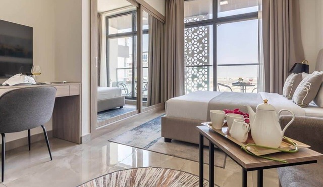 Bright and Spacious Studio near DWC Airport!