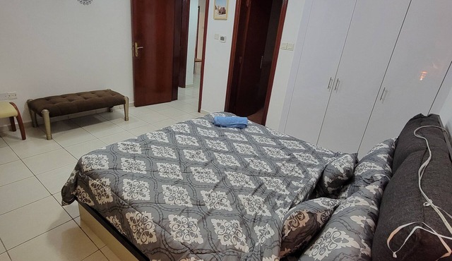 Charming 2-bedroom apartment with AC, WiFi in delightful Sharjah