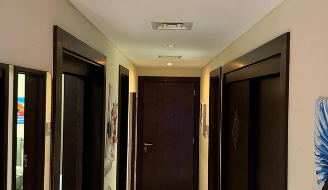 Charming 2-bedroom condo in Muscat with WiFi, fitness room, AC