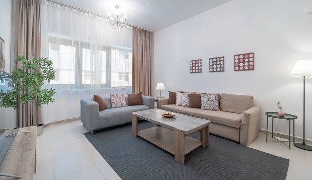 Cozy Apartment in Al Nahda with Pool and Gym