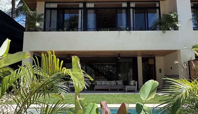 Open the back gate, walk 5’ down a jungle trail and arrive to Playa Hermosa