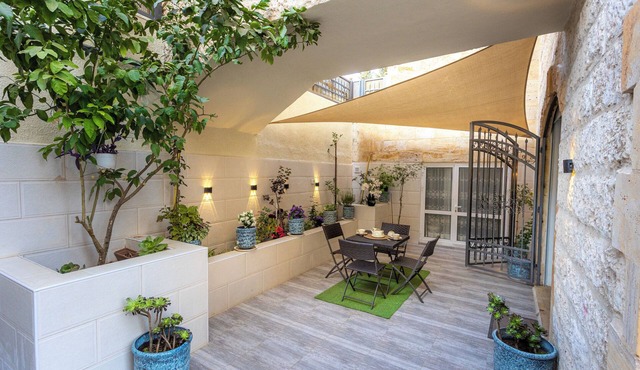 Elegant 2BR Family Oasis with Lush Private Garden
