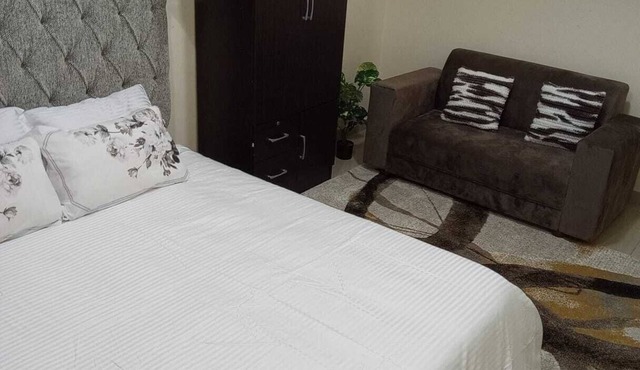 Escape to comfortn 2-bedroom apartment with WiFi, AC in fabulous Abu Dhabi