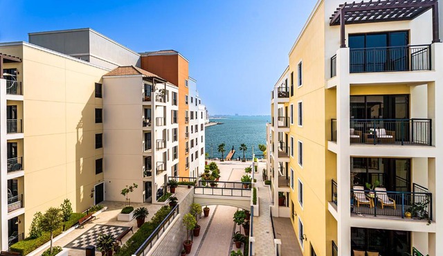 Escape24 Luxury 2BR Sea View with Beach Access in La Mer
