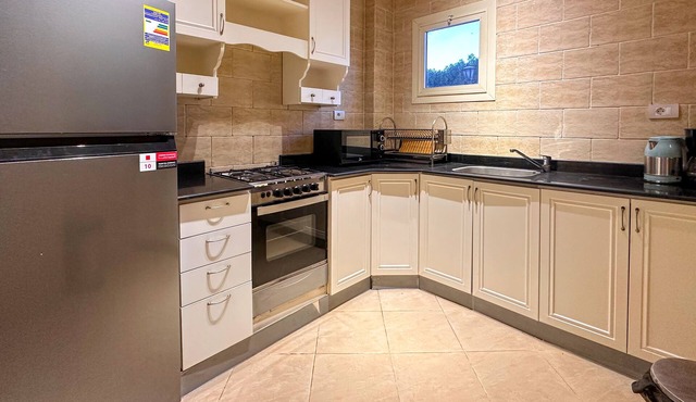 Exclusive apartment with private garden area and big swimming pool