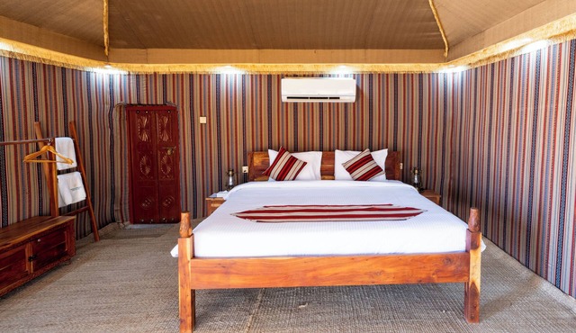Experience Wahiba in the comfort of our Premium Tents at Thousand Nights Camp