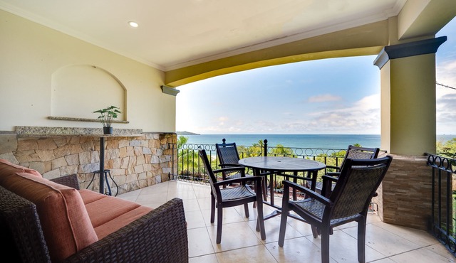 Fabulous ocean-view apartment with balcony, pool, grill, & full kitchen