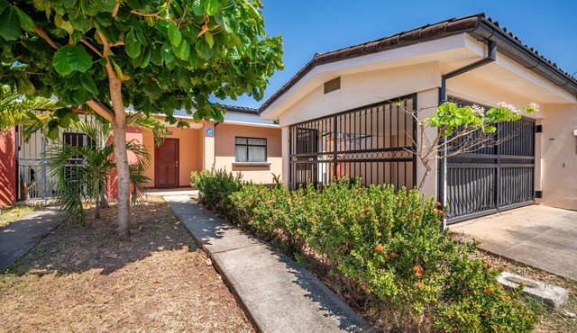 Home in a gated community with outdoor pool, patio, grill, streaming, W/D, & AC