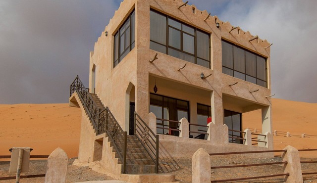 Immerse in ultimate desert elegance with the Sand Suite at Thousand Nights Camp