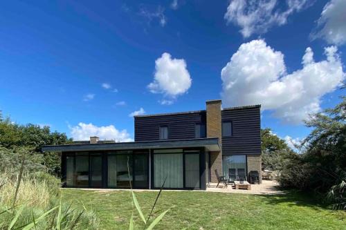 Luxe 8 persoons ‘Golfvillatexel’ vlakbij zee in De Cocksdorp