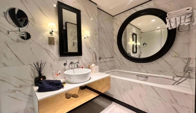 Luxury 1 BHK Apartment with City & Canal Views!
