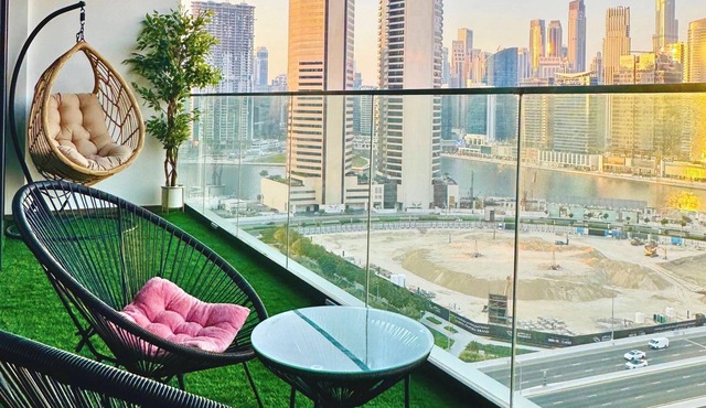 Modern 1BR with Burj Khalifa & Canal View Near Downtown Dubai & DIFC