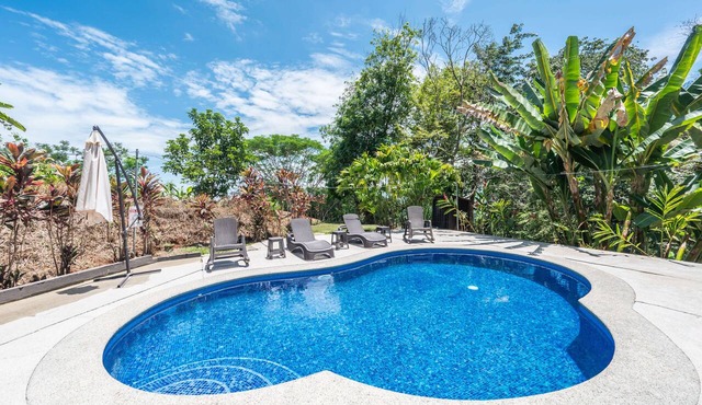 Modern gated mountain villa in Tarcoles with a private pool, tropical surroundings, fast WiFi, Smart TVs, and spacious indoor living. Perfectly located near Carara National Park, Jacó, Playa Mantas, and Los Sueños Marina.