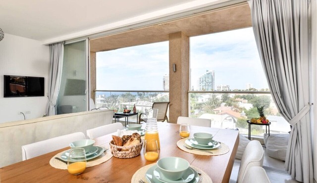 Modern Gem with Stunning Balcony by Sea N Rent