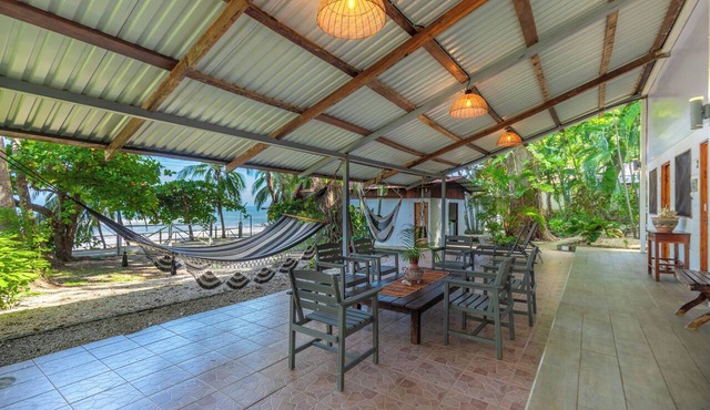 Open-air oceanfront home for 14 - steps to the sand in South Guiones, Nosara