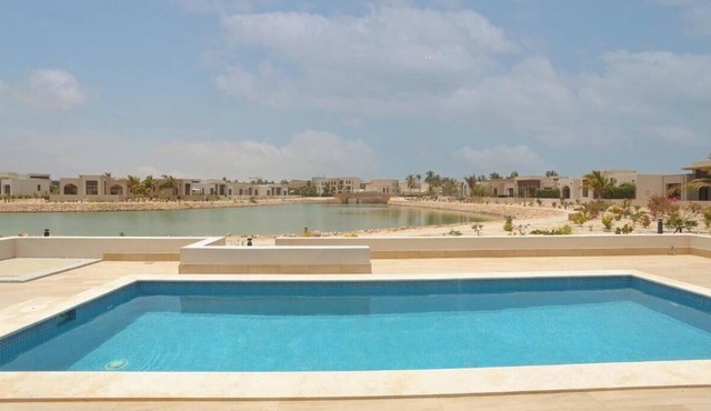 Peaceful 2-Bedroom Pool Escape