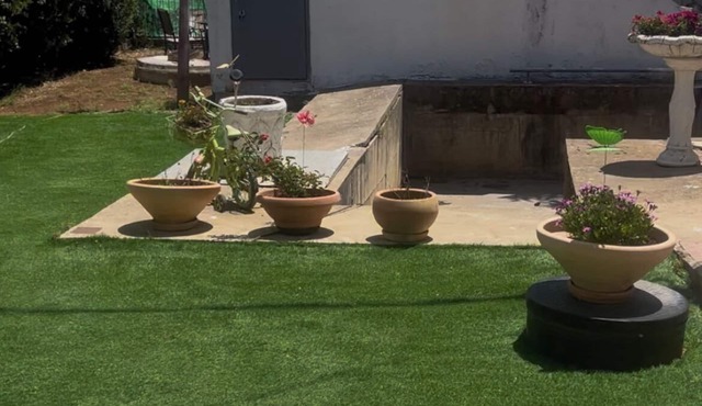 Renovated one room unit with a bomb shelter and a garden.