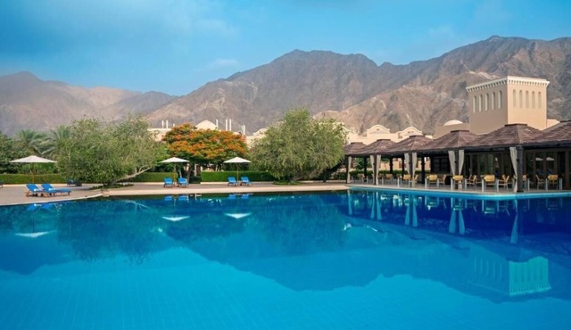 Sip Your Morning Coffee with Spectacular Pool Views Near Local Attractions