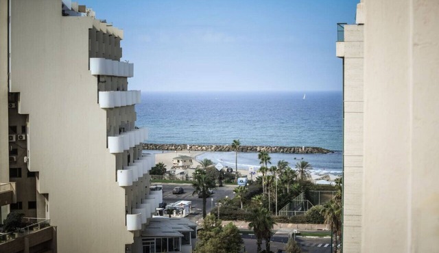 Skyline 1BR Apartment with City and Sea View