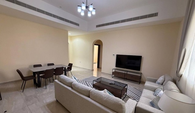 Spacious 4-bedroom apartment with WiFi, AC in terrific Shakhbout City