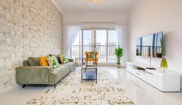 Sunny 1BR at Canal Residences West Dubai Sports City by Deluxe Holiday Homes
