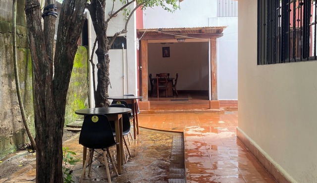 Sunrise Guest House: Cozy rooms, Spanish lessons, tours, and shuttles in León.