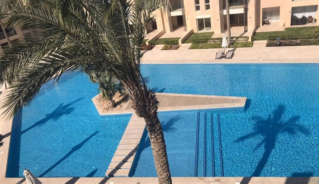 Superior apartment with private beach and 160 meter long pool!