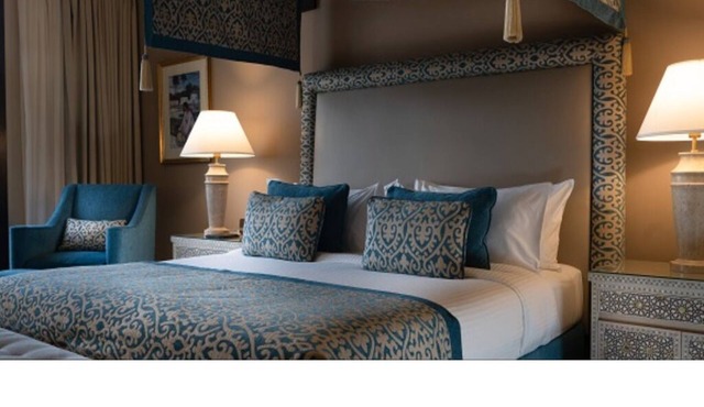 Unwind in an Inviting Room with Side Sea Views - Near Beach Adventures