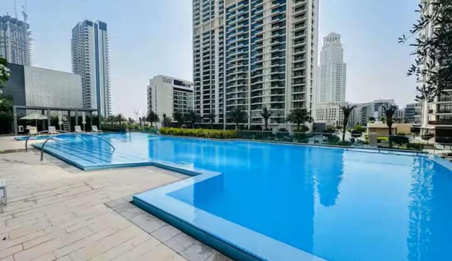 Vogue Vacation Homes, Creek Harbour Icon Bay Waterfront Living Close to Downtown, Burj Khalifa and Dubai Mall, Three Bedroom Apartment with Large Balcony, Canal and Burj Khalifa View, Access to all Amenities