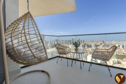 Vogue Vacation Homes, JVC Binghatti Phantom near Circle Mall, One Bedroom Apartment with Large Balcony and City View, Access to all Amenities