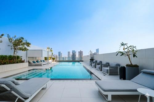 Vogue Vacation Homes, Luma Park Views JVC Near Circle Mall, Two Bedroom Apartment with Balcony, Park, City and Vibrant community View, Access to All Amenities