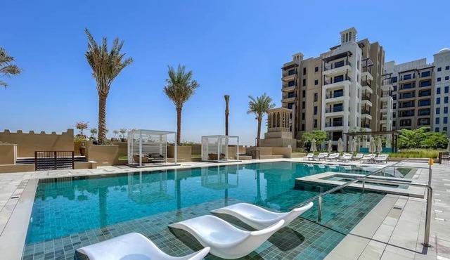 Vogue Vacation Homes, Madinat Jumeirah Living Rahaal Near Burj Al Arab One Bedroom Apartment with Balcony and Vibrant Community View, Access to all Amenities