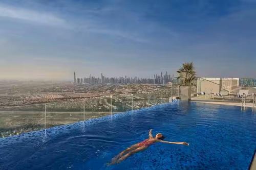 Vogue Vacation Homes, Novotel Residences JVT near Springs Souk Mall, One Bedroom apartment with Balcony and Vibrant Community View, Access to all Amenities