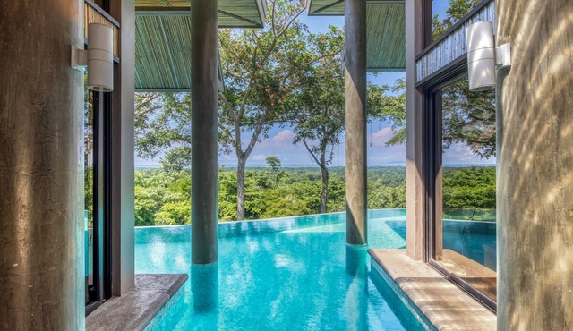 Wonderful home surrounded by nature with ocean views, private pool, and deck