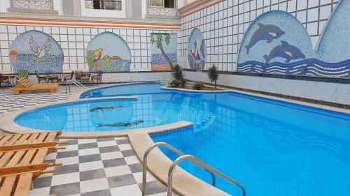 Studio pool view next to the Marina,Sheraton Plaza 320 in Hurghada