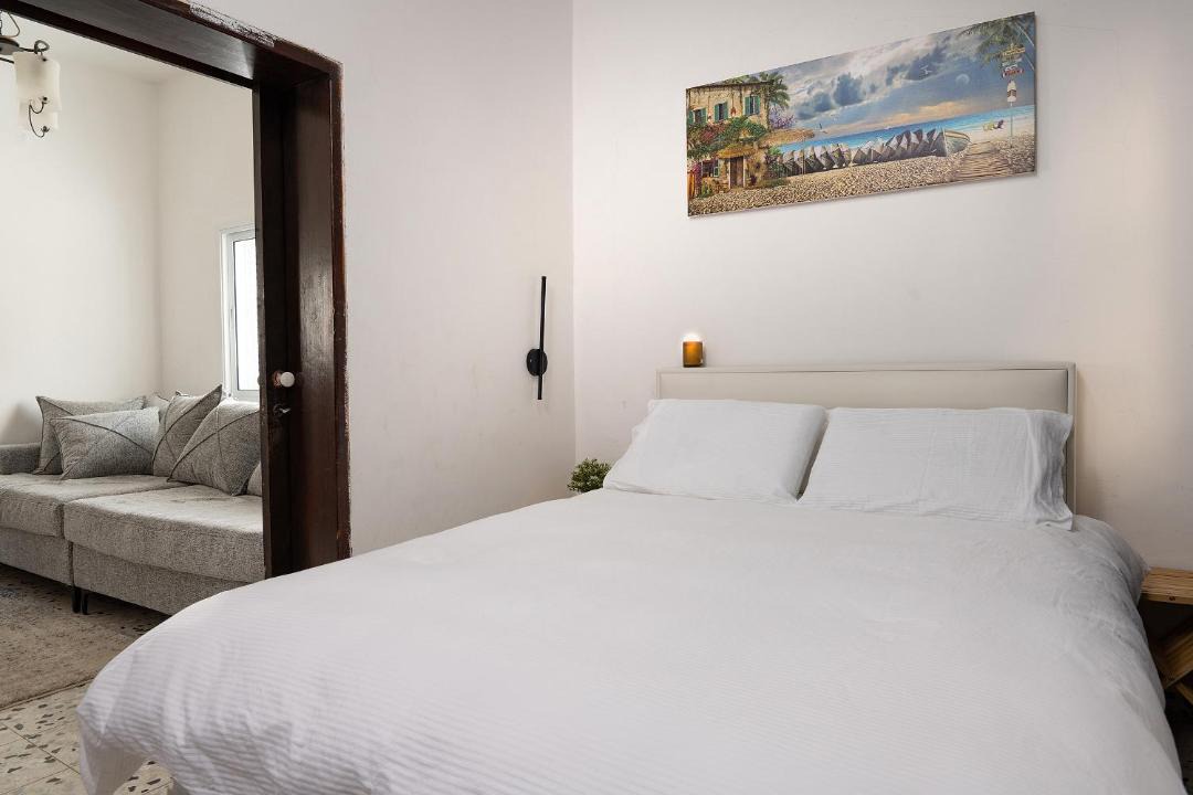 Tel Mond Apartment | נוף לפרדסים תל מונד - דירה מהממת עם 2 חדרי שינה ומרפסת גג