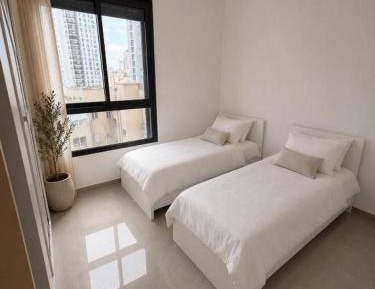 Three-Bedroom Apartment with Water View