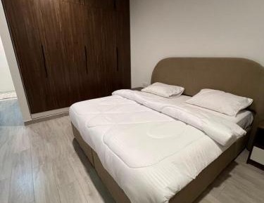 Three-Bedroom Premium Apartment with Balcony