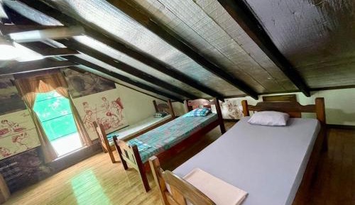 Single Bed in Dormitory Room