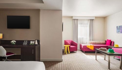 Classic Family Room with one queen bed and two sofa beds.