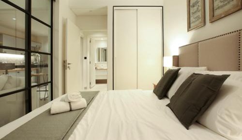 One-Bedroom Apartment with Balcony and City View