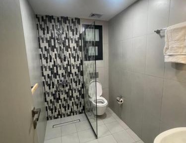 Three-Bedroom Premium Apartment with Balcony