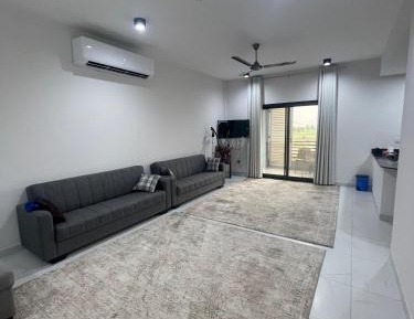 Three-Bedroom Apartment with Balcony